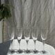 Set of 5 glass champagne flutes with twisted ribbed base