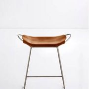 Contemporary bar stool with organic design in aged silver metal and natural tobacco leather.