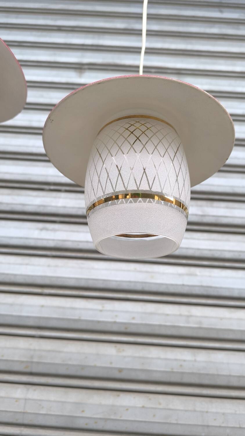 Pair of enamelled sheet metal and glass pendant lights