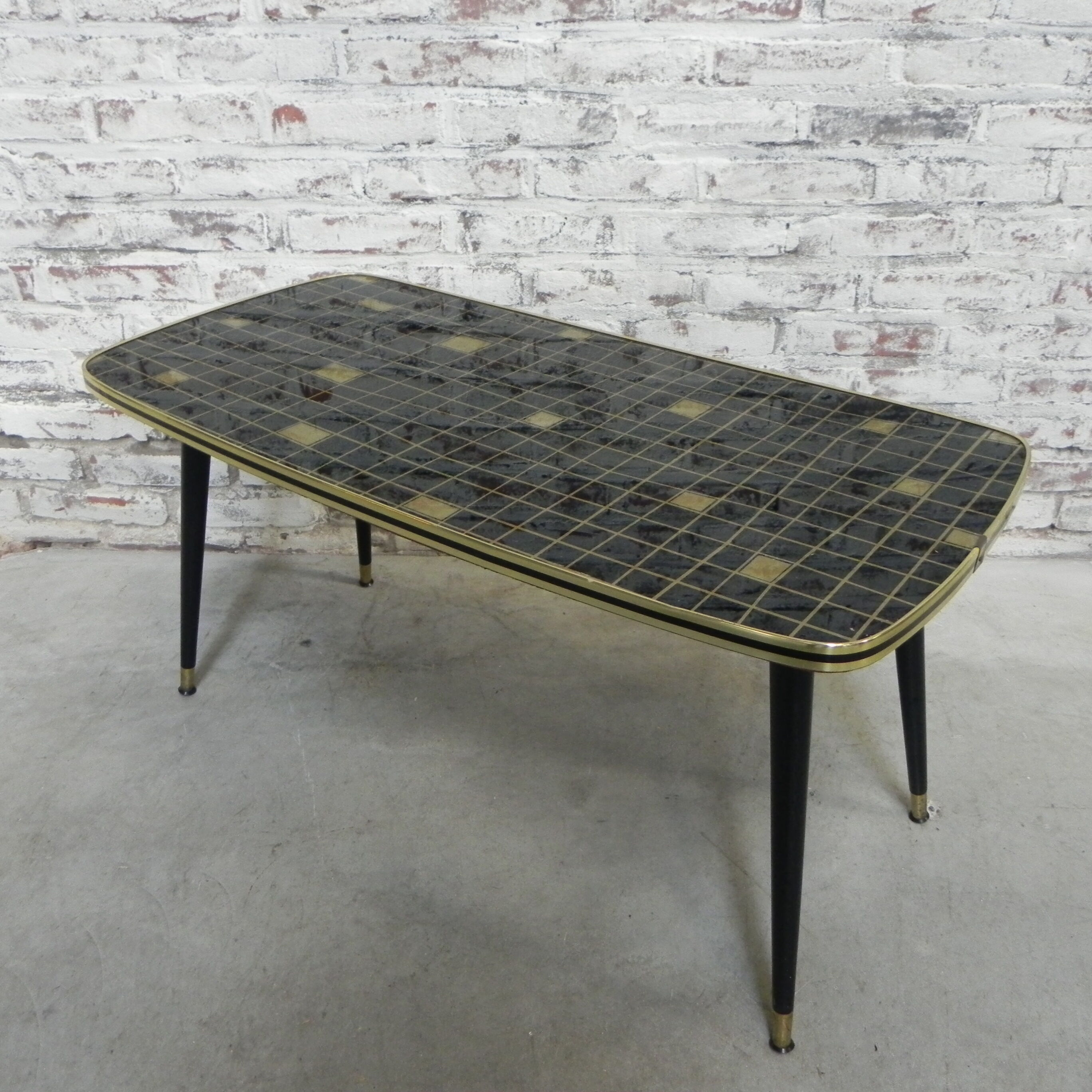 Vintage coffee table with glass top