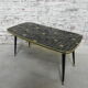 Vintage coffee table with glass top