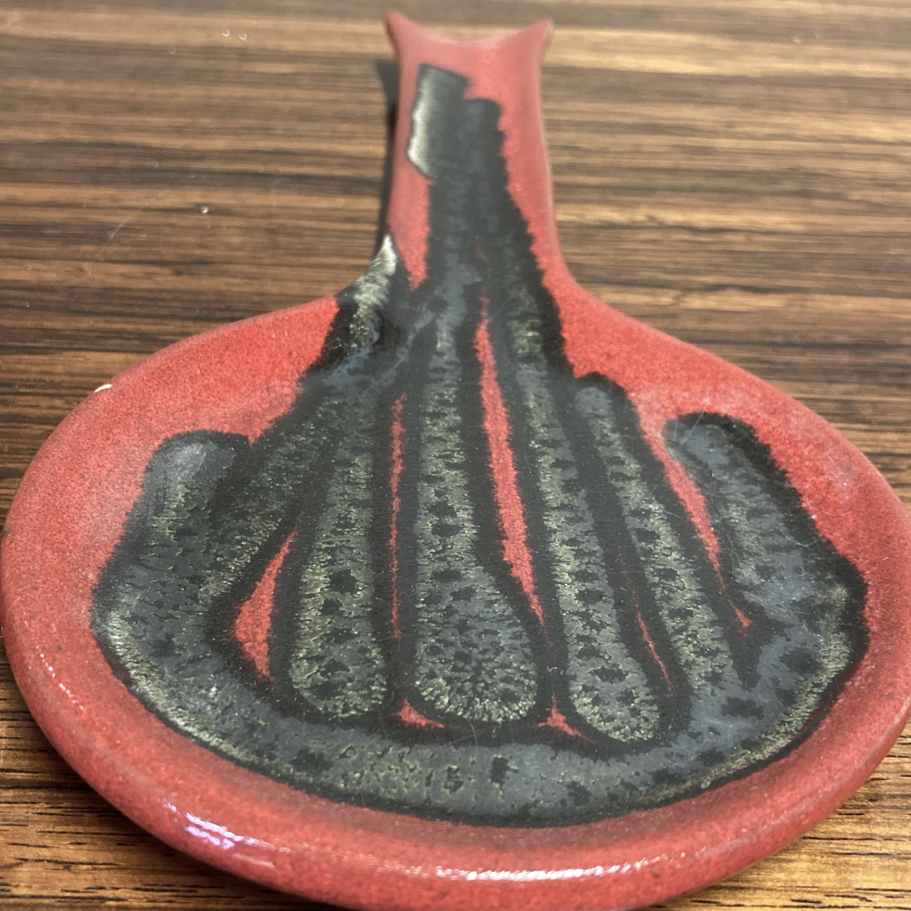 Pair of entirely handmade ceramic spoons.