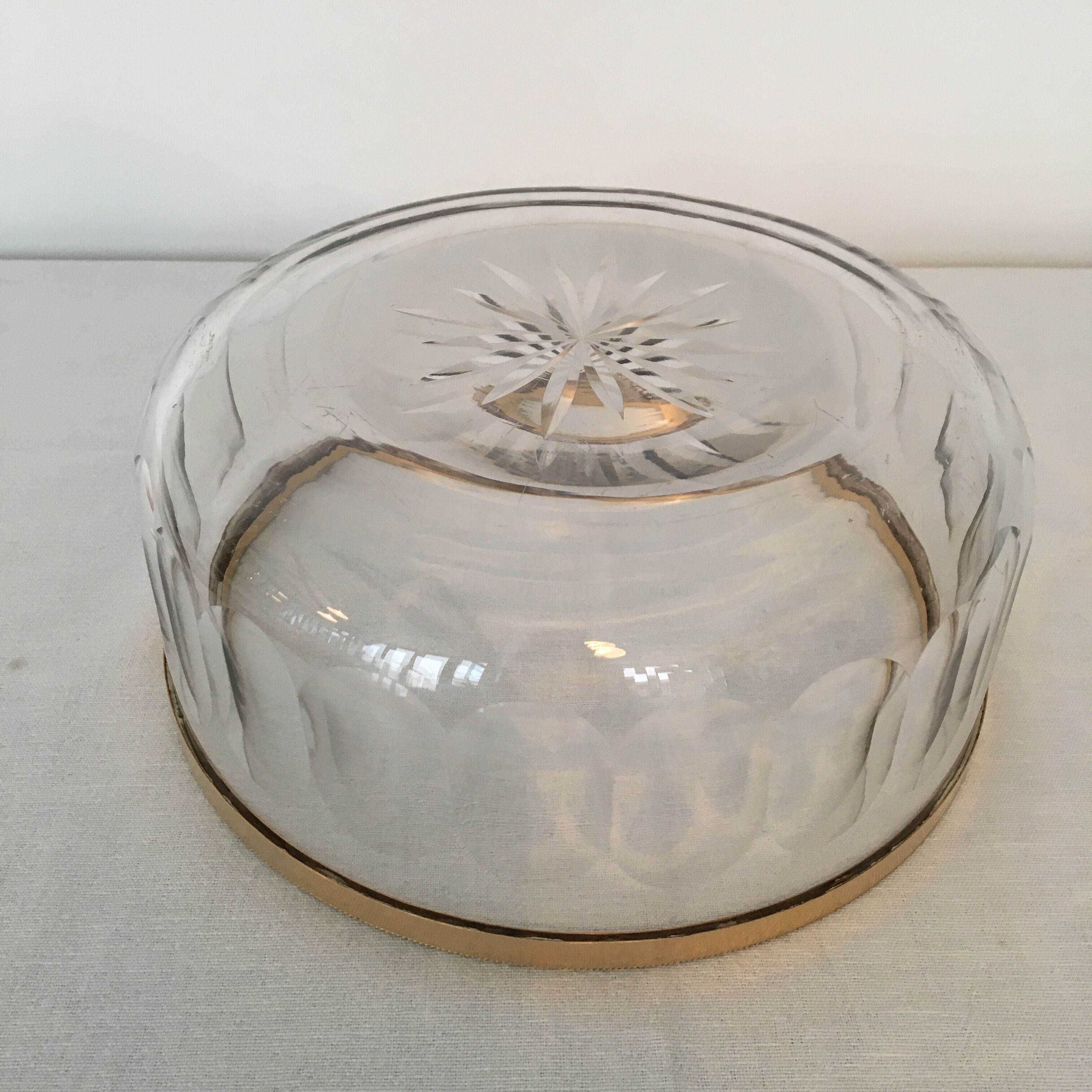 Crystal bowl trimmed surrounded gold metal