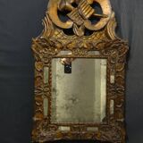 Miroir Régence à parcloses en bois sculpté doré 39 x 65 cm