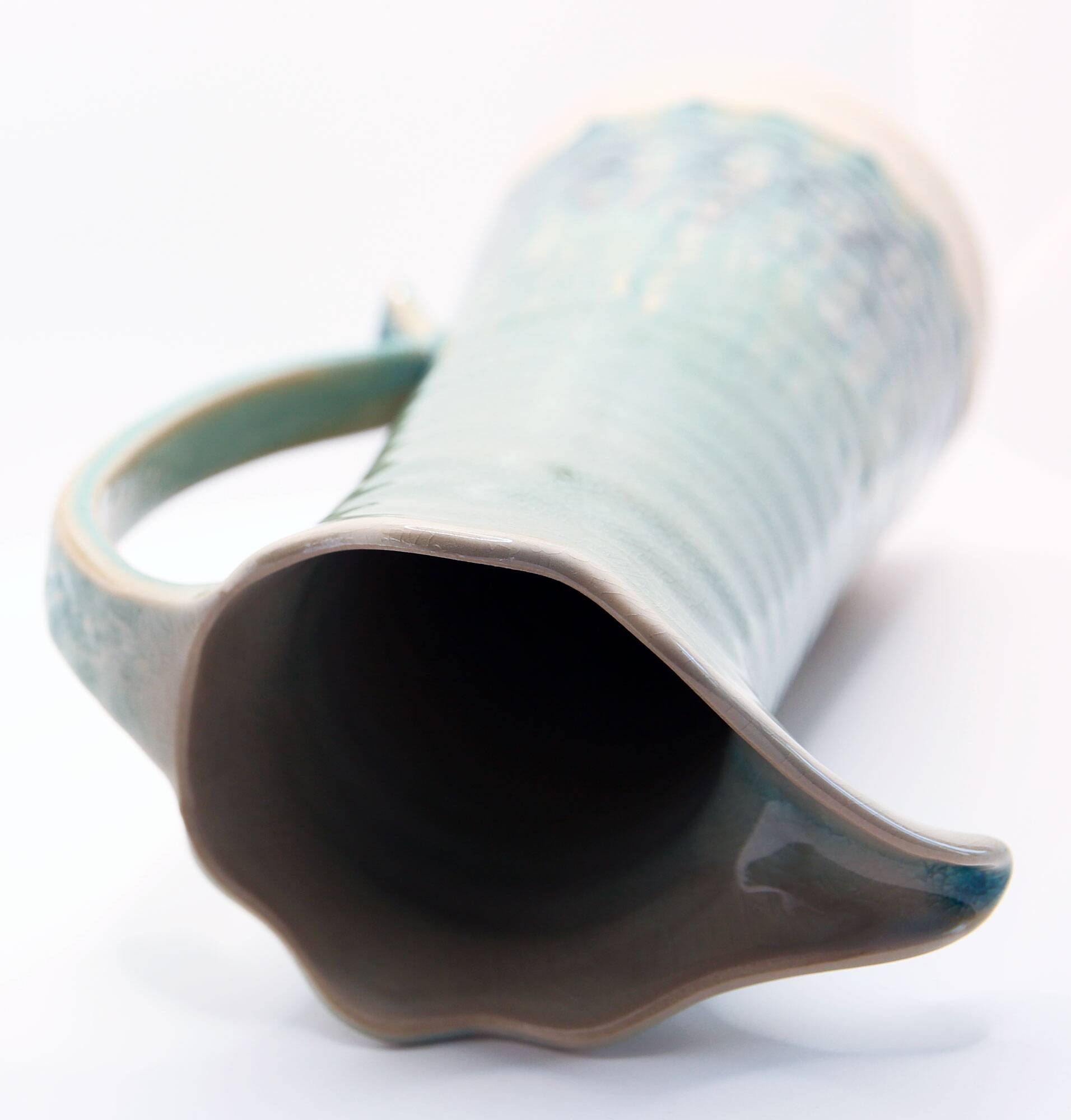 Handcrafted XL pitcher in mint green enameled stoneware