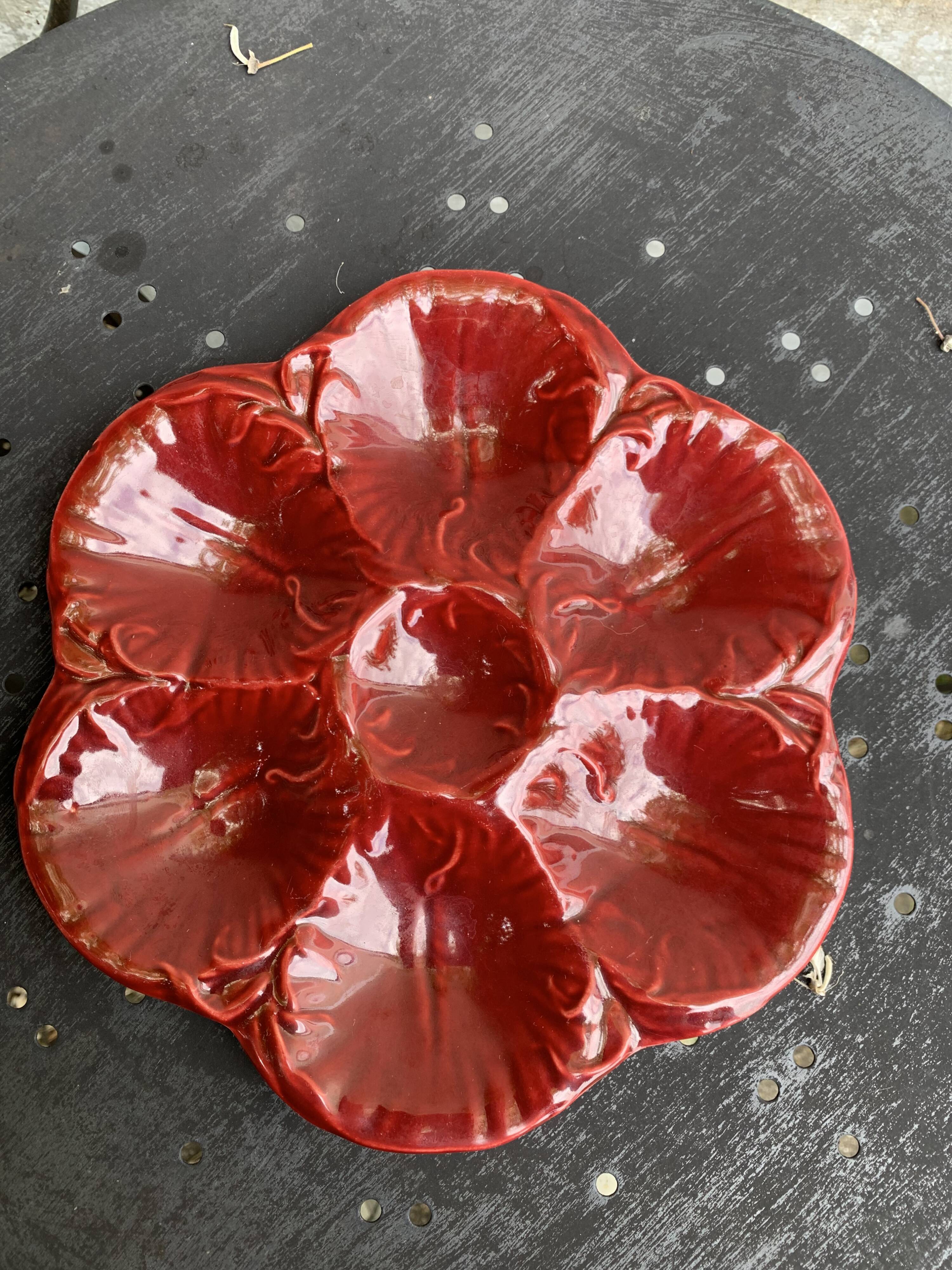 4 oyster plates in vintage red glazed ceramic slip and collector