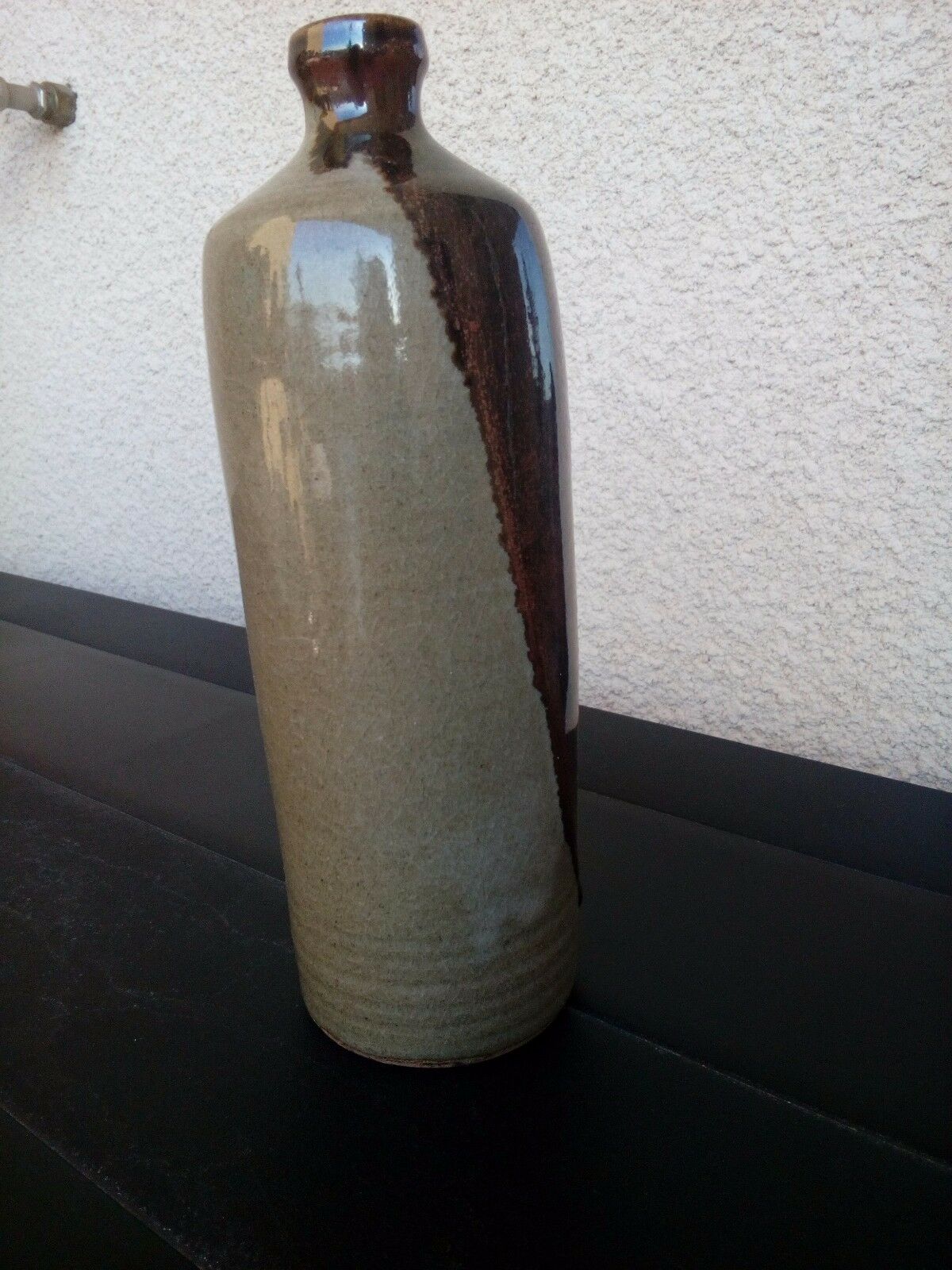 Enamelled sandstone bottle