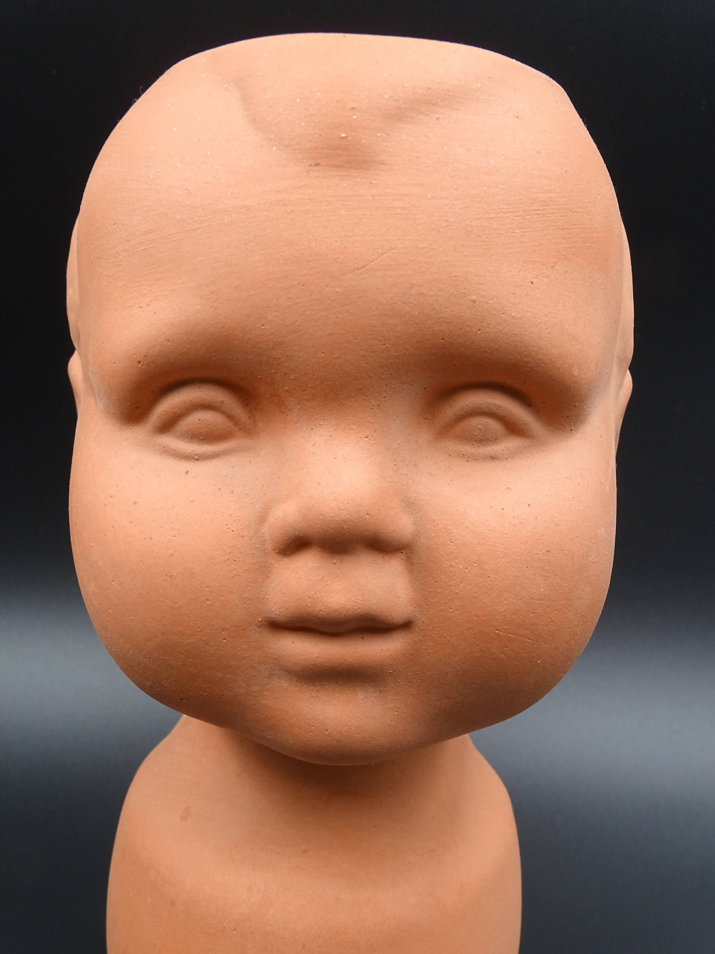 Vase in the shape of a baby's head - poupon