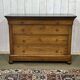 Commode Restauration XIXème en merisier et dessus marbre noir