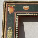 Hand-painted wooden frame with fruit decoration