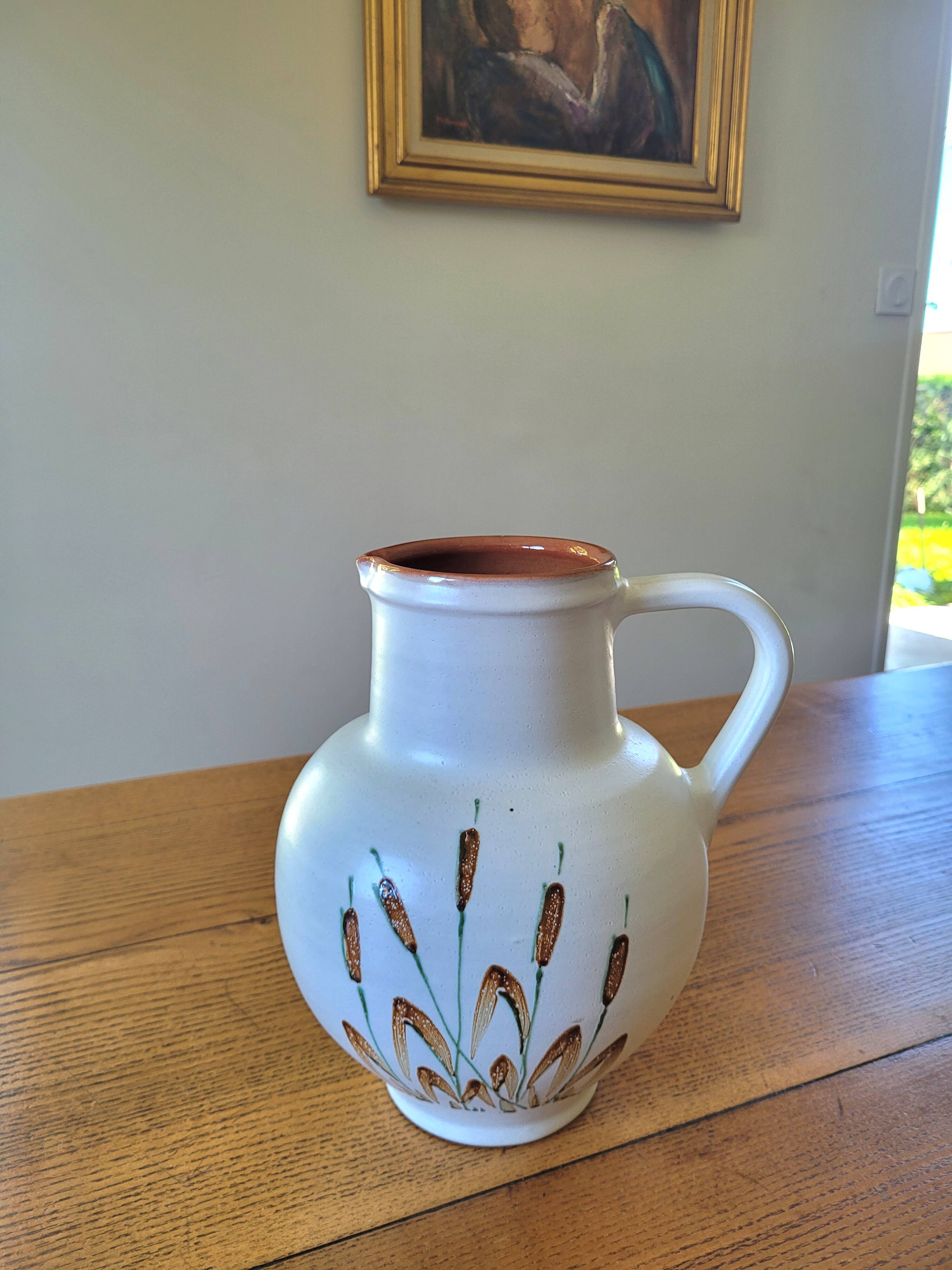 XL ceramic pitcher signed