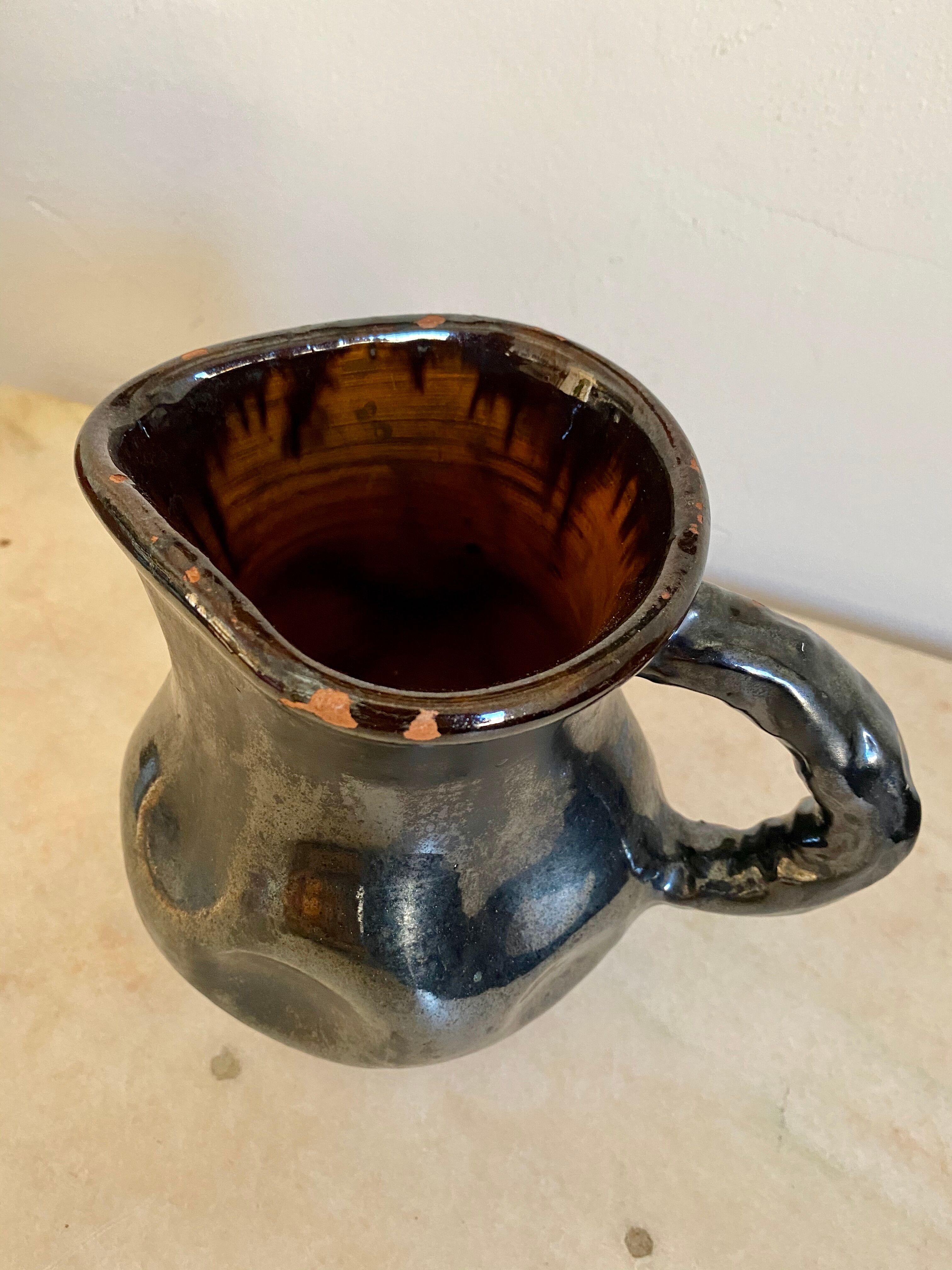 Joseph Elie ceramic pitcher