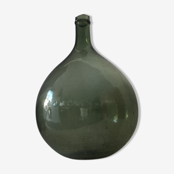 Demijohn old bottle in blown glass