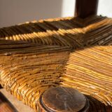 Low fireplace chair attributed to Charles Dudouyt.