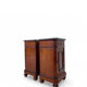 A pair of antique walnut bedside tables from the 1890s.