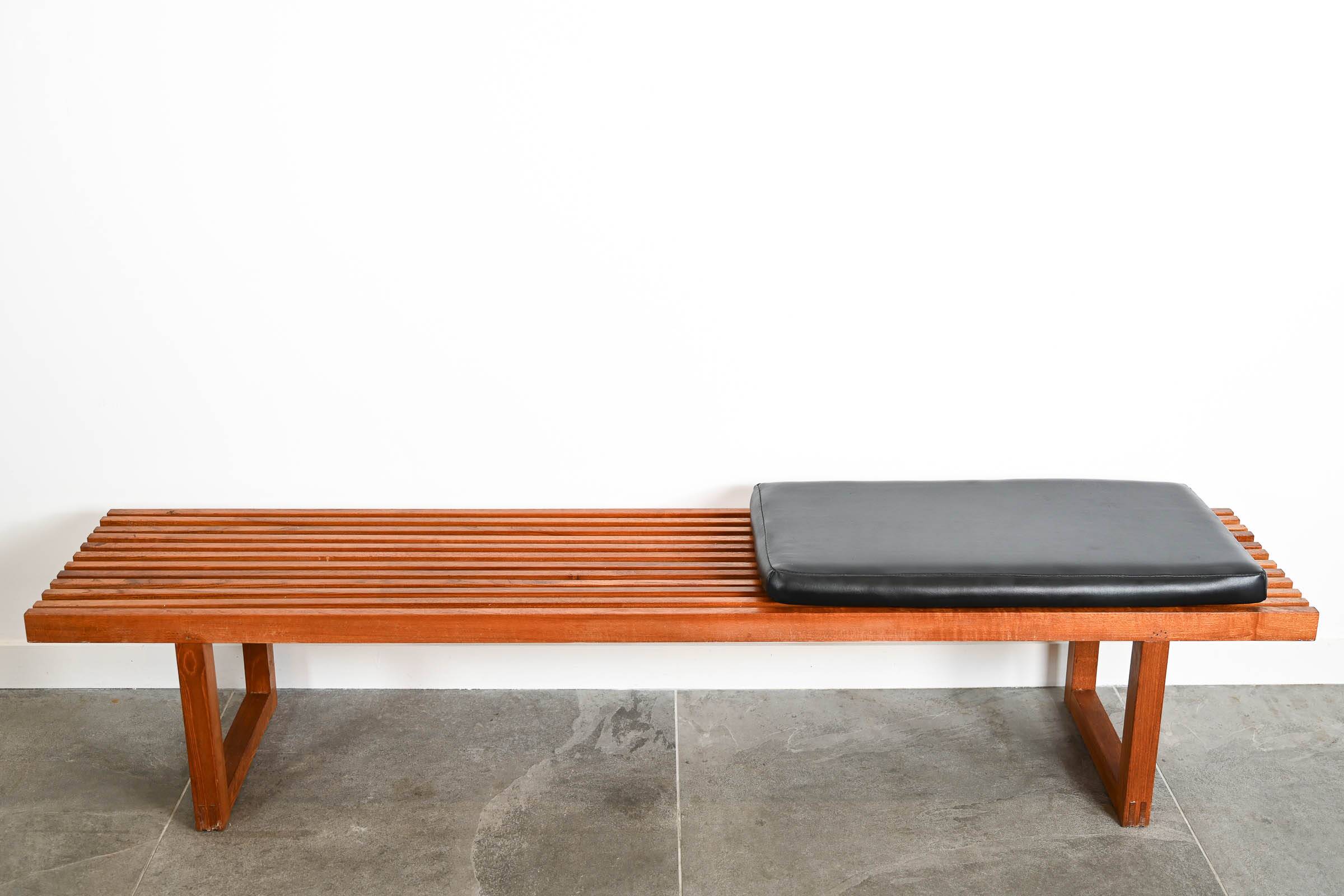Teak bench with black leatherette seat cushion Origin Denmark years