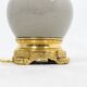 Cracked celadon porcelain lamp with gilded bronze, circa 1880