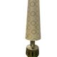 Vintage ceramic floor lamp with illuminated base.