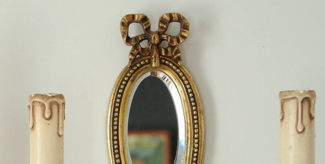 Paire d'appliques en bronze style Louis XVI Lucien Gau