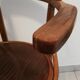 Pair of curved wooden armchairs