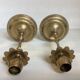 Pair of brass candlesticks with worked flower balls.