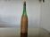 Rattan and glass "bottle" lamp from the 60s and 70s