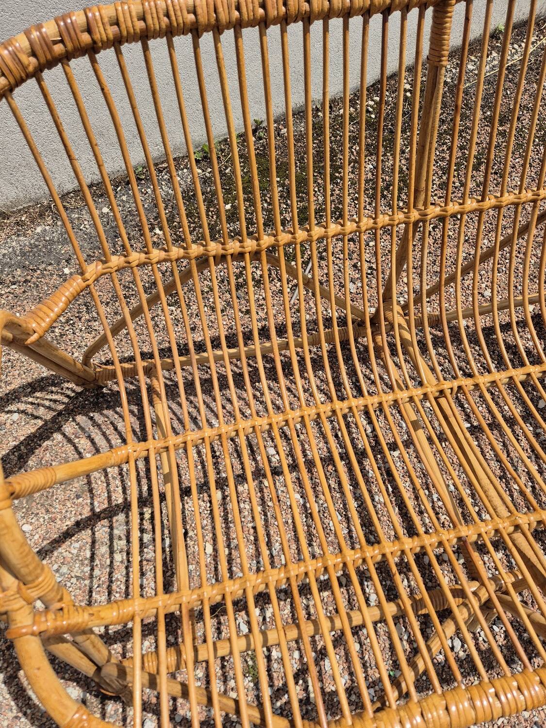 Rattan lounge with two armchairs and a vintage 1950s bench.