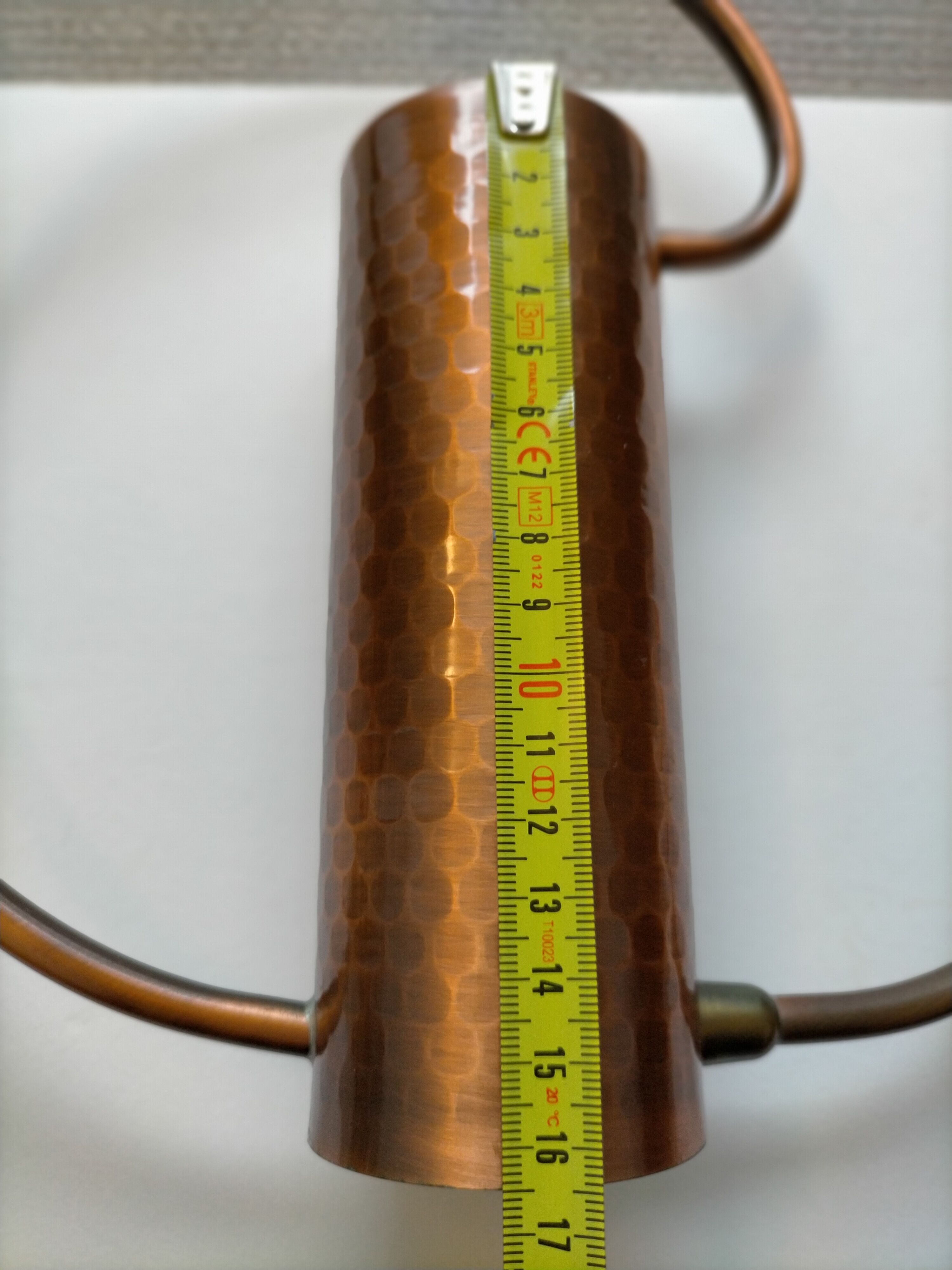 Hammered copper watering can