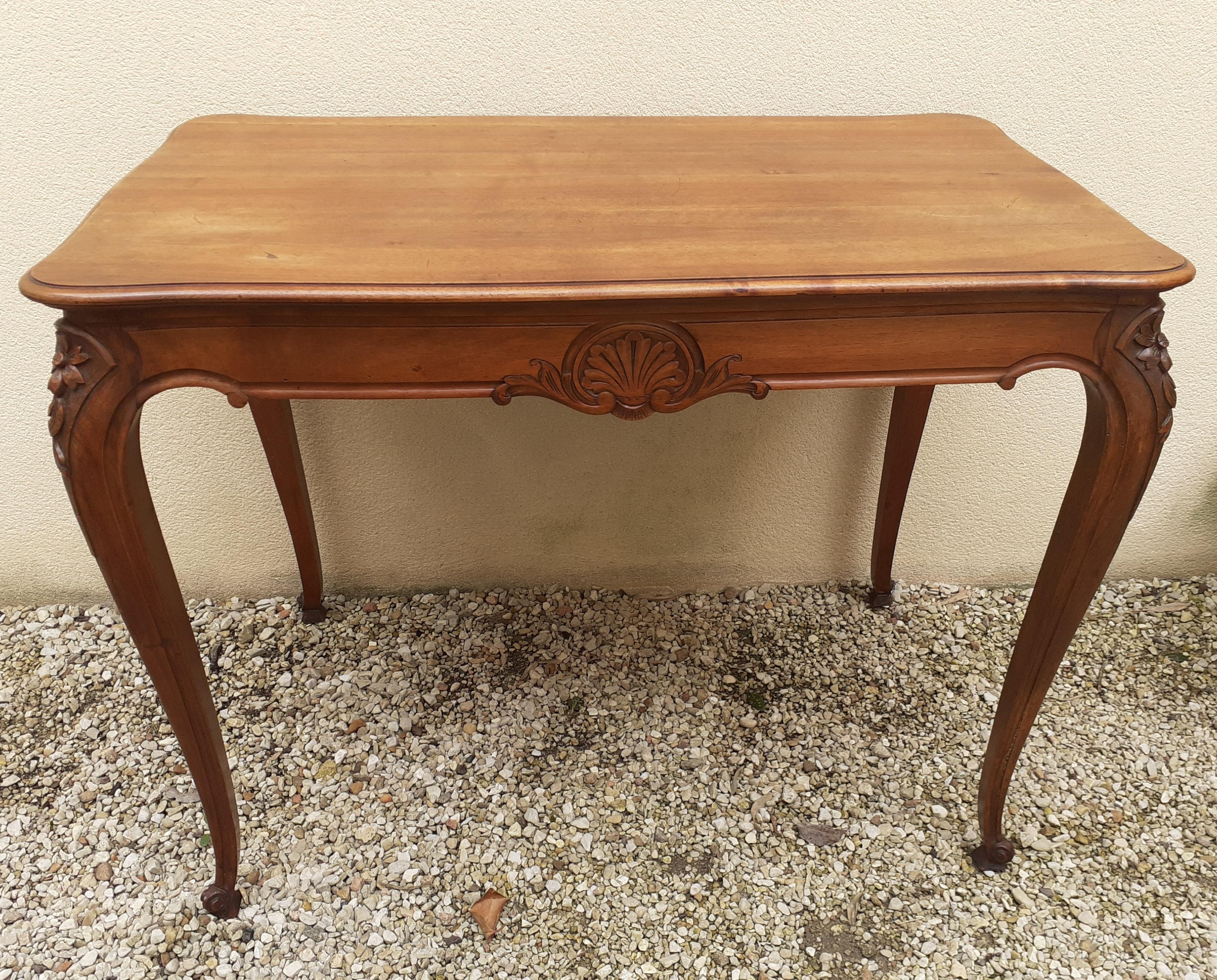 Flat desk, one-drawer table, nineteenth century carved walnut top in Louis XV style