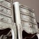 A pair of distressed bedside tables.