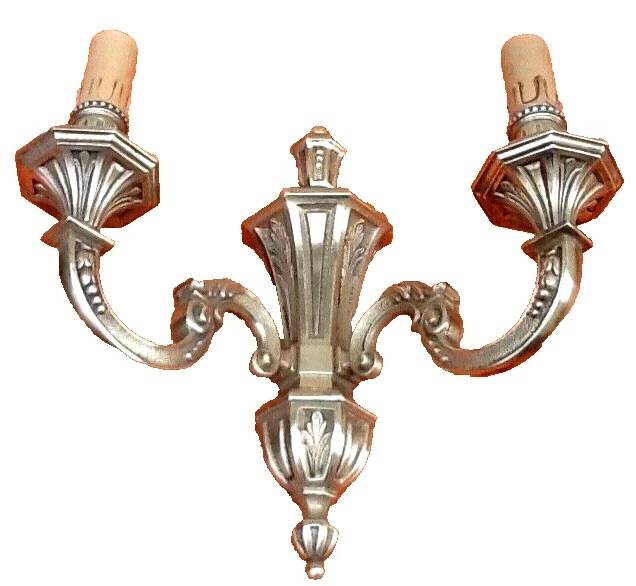 Large wall sconce in LXV style, patinated bronze.