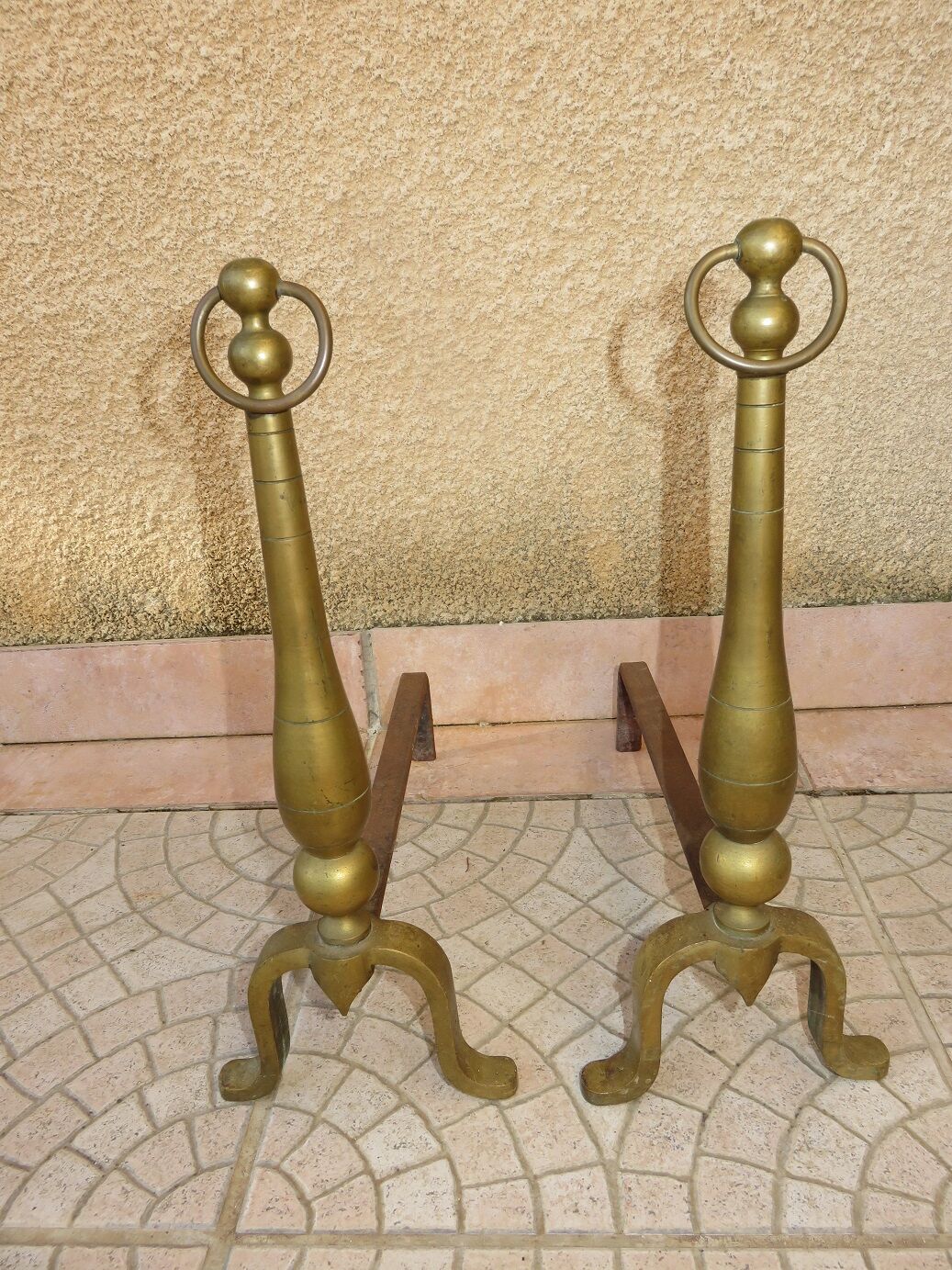 Brass andirons
