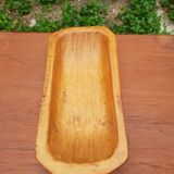 Vintage wooden pocket emptier