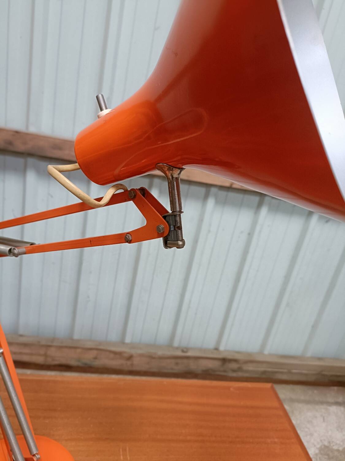 Luxo L4 vintage orange lamp with foot