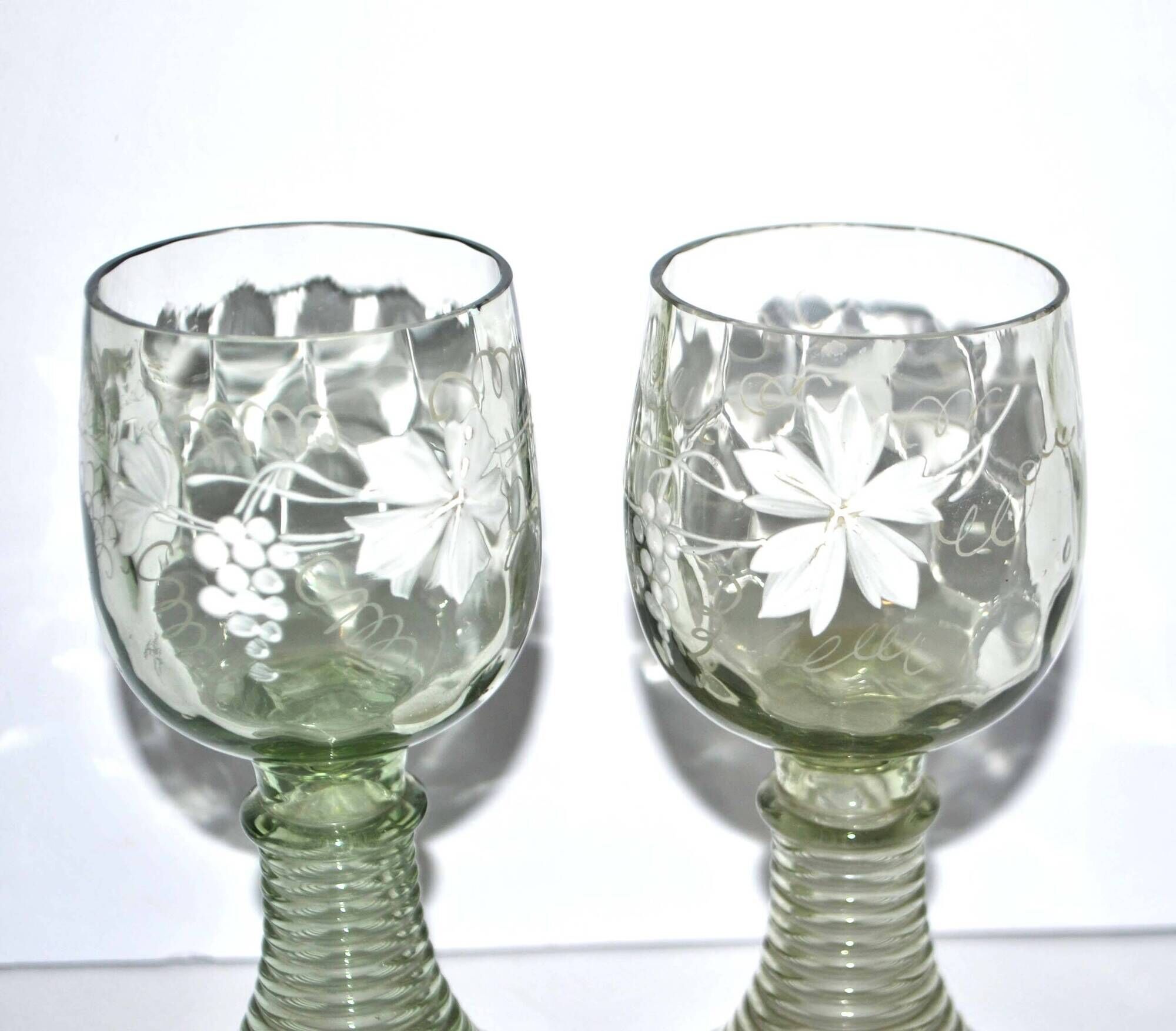 Roemer old rhine wine glass in light green white enamelled blown glass