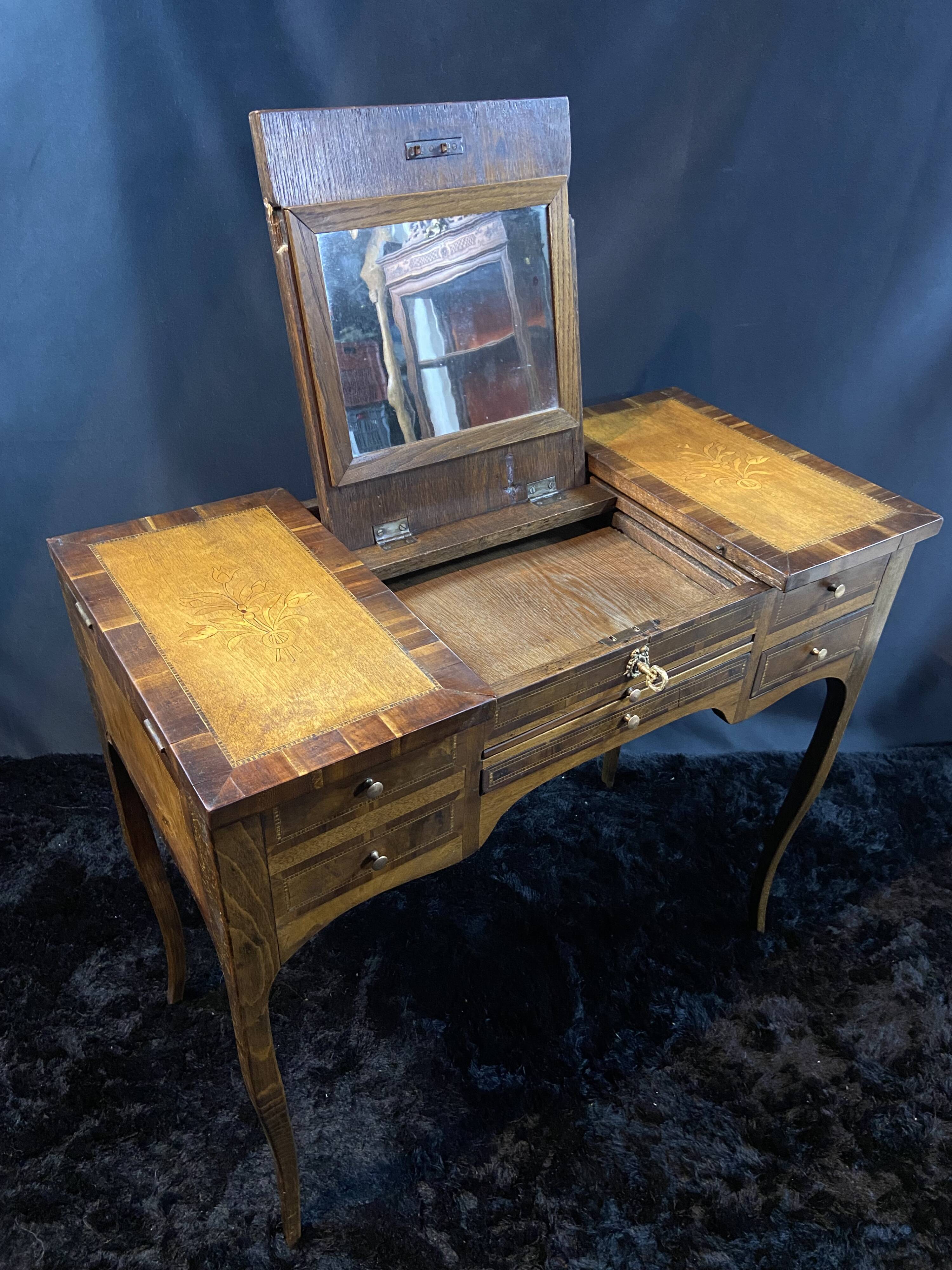 19th-century hairdresser with marquetry decoration on oak in the Louis XV Transition style.