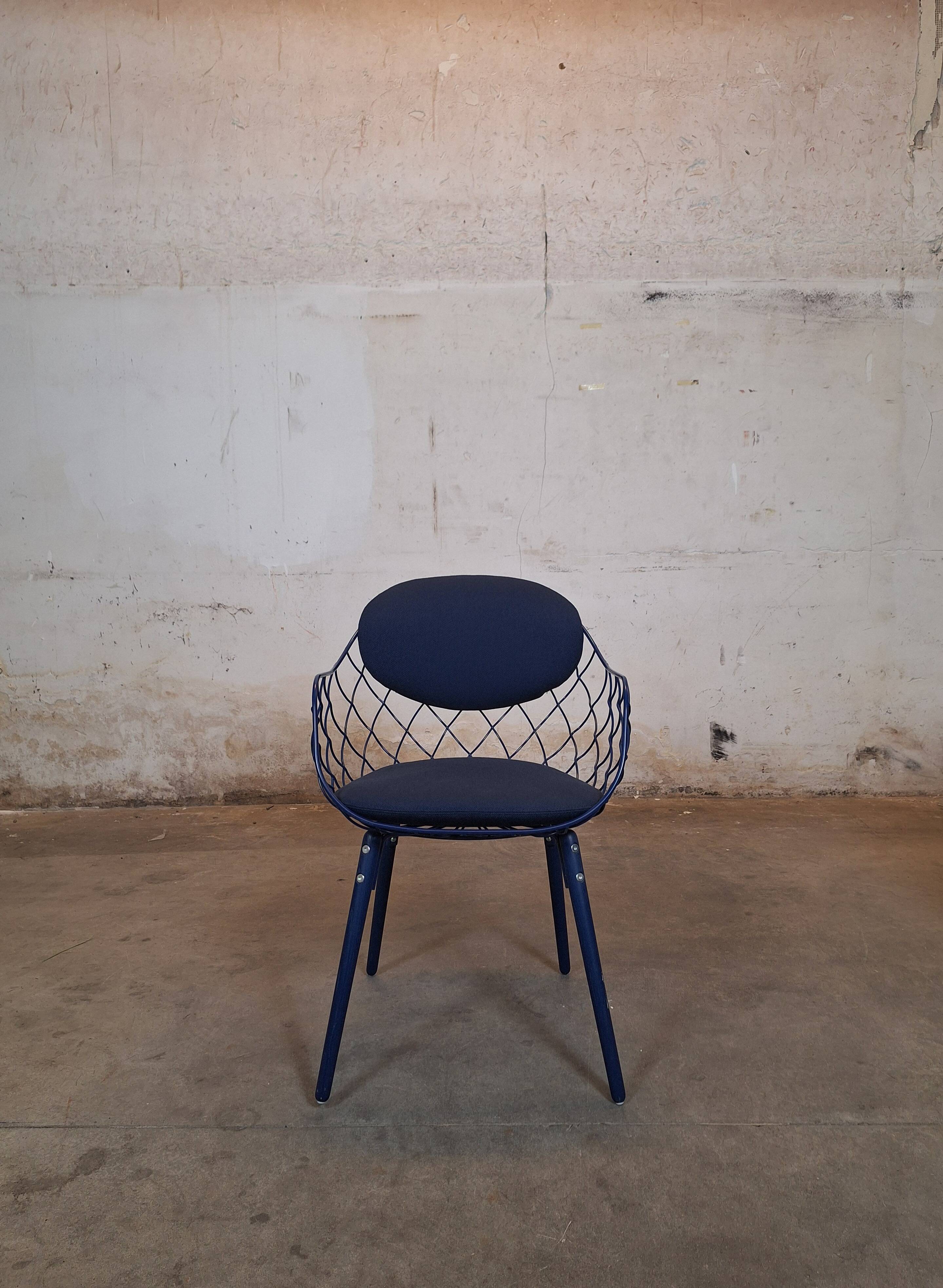 Magis Piña blue chair with metal frame and padded seat