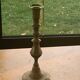 Brass candlestick, gold metal turns and chiseled original and vintage