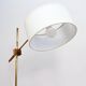 Floor lamp with a swivelling arm
