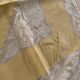 Tablecloth and 12 straw-colored napkins from the 50s.