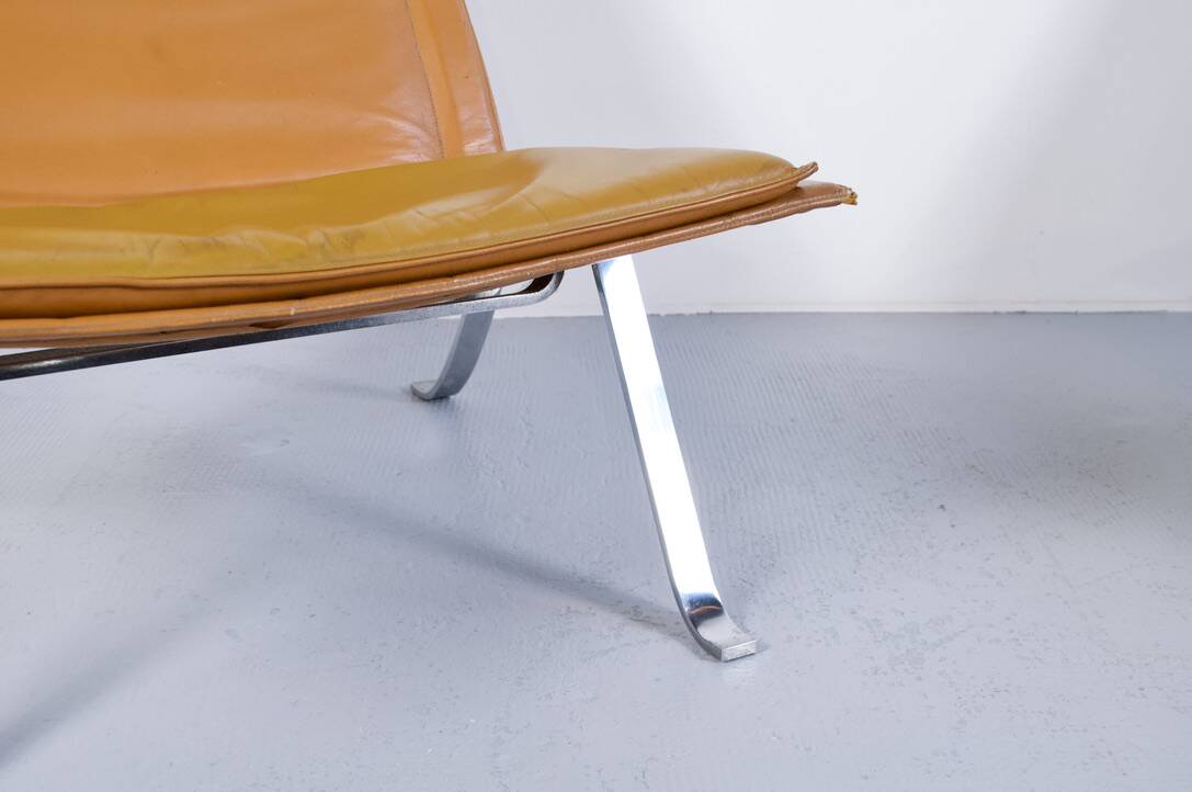 Imposing pair of leather and steel armchairs from the 1960s