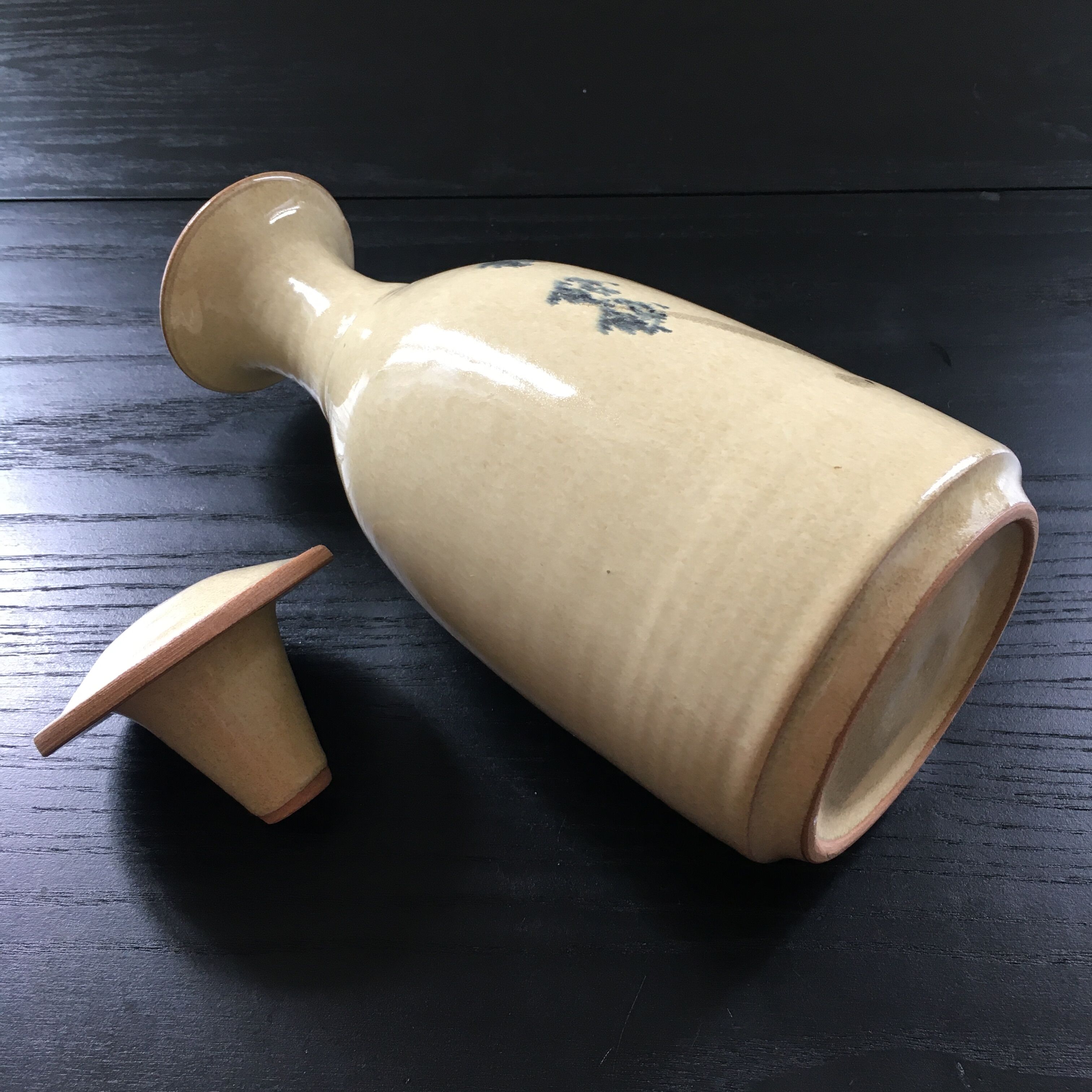 Stoneware carafe with floral decoration