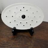 Old iron clay draining plate