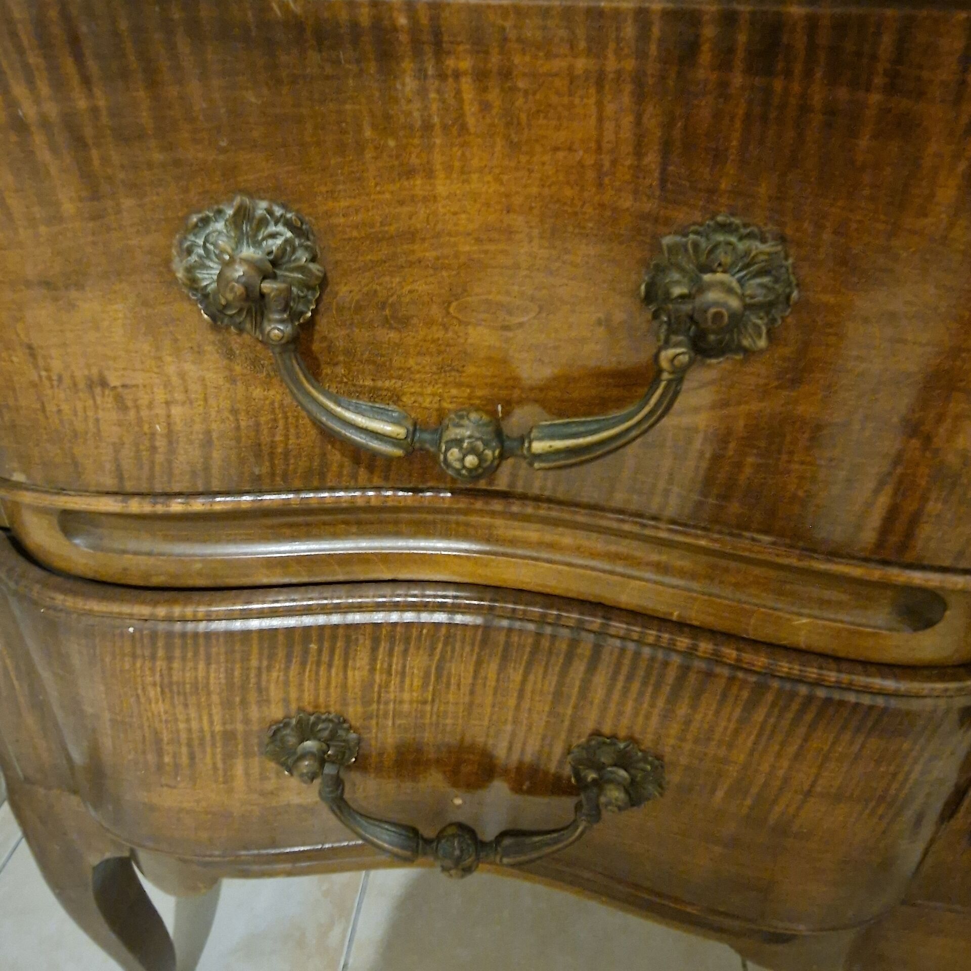 curved commode in Louis XV style made of solid wood