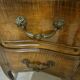 curved commode in Louis XV style made of solid wood