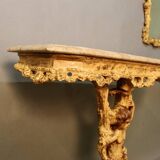 Marble top console and its rocaille style mirror