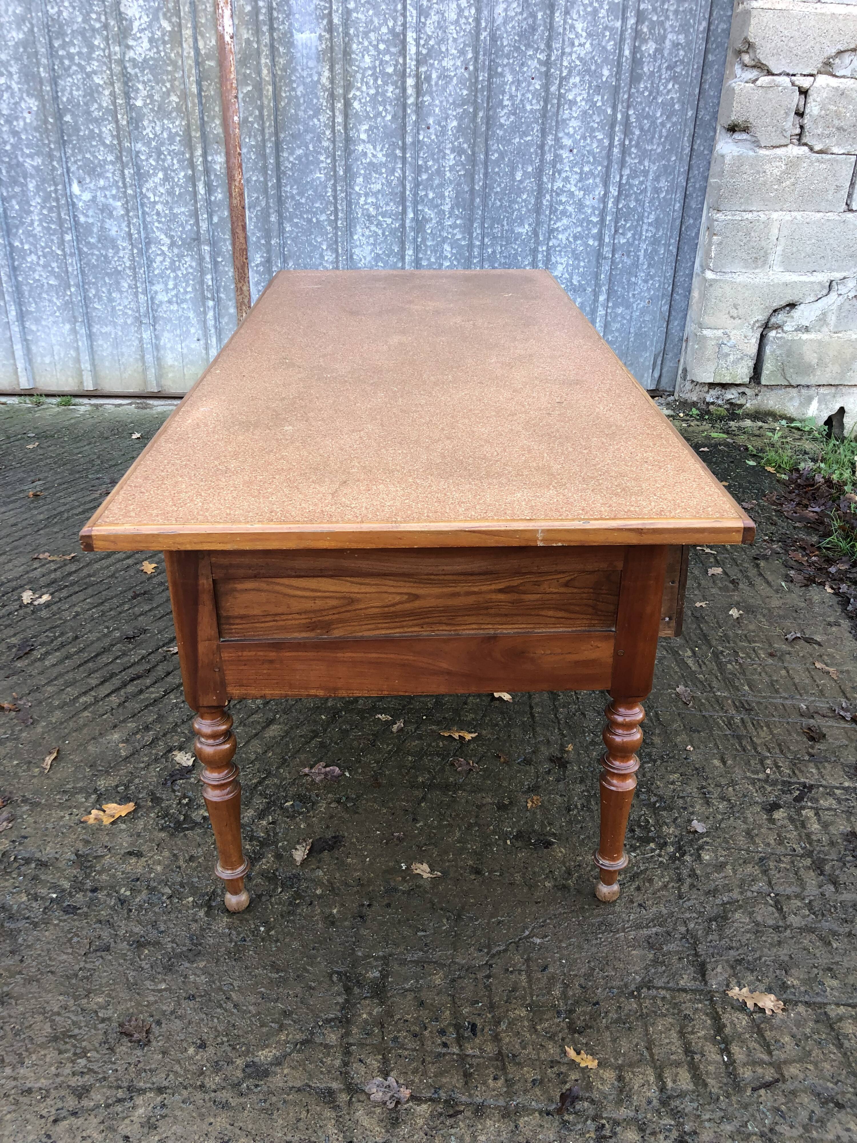 Solid cherry game table with 2 front drawers and panelled crosspieces.