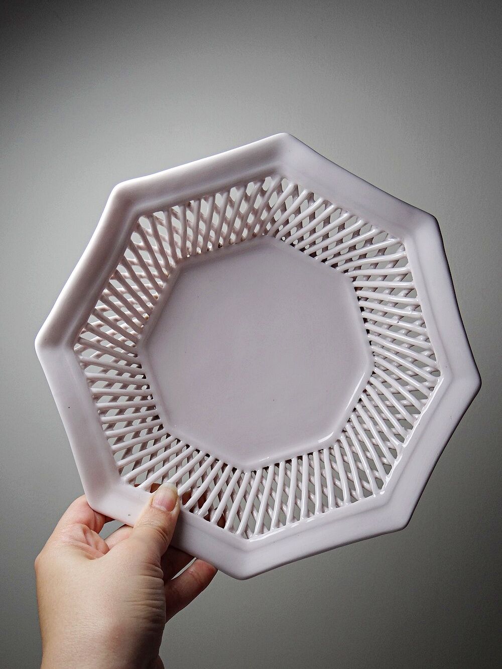 Pale pink woven octagonal porcelain bowl, circa 1950.