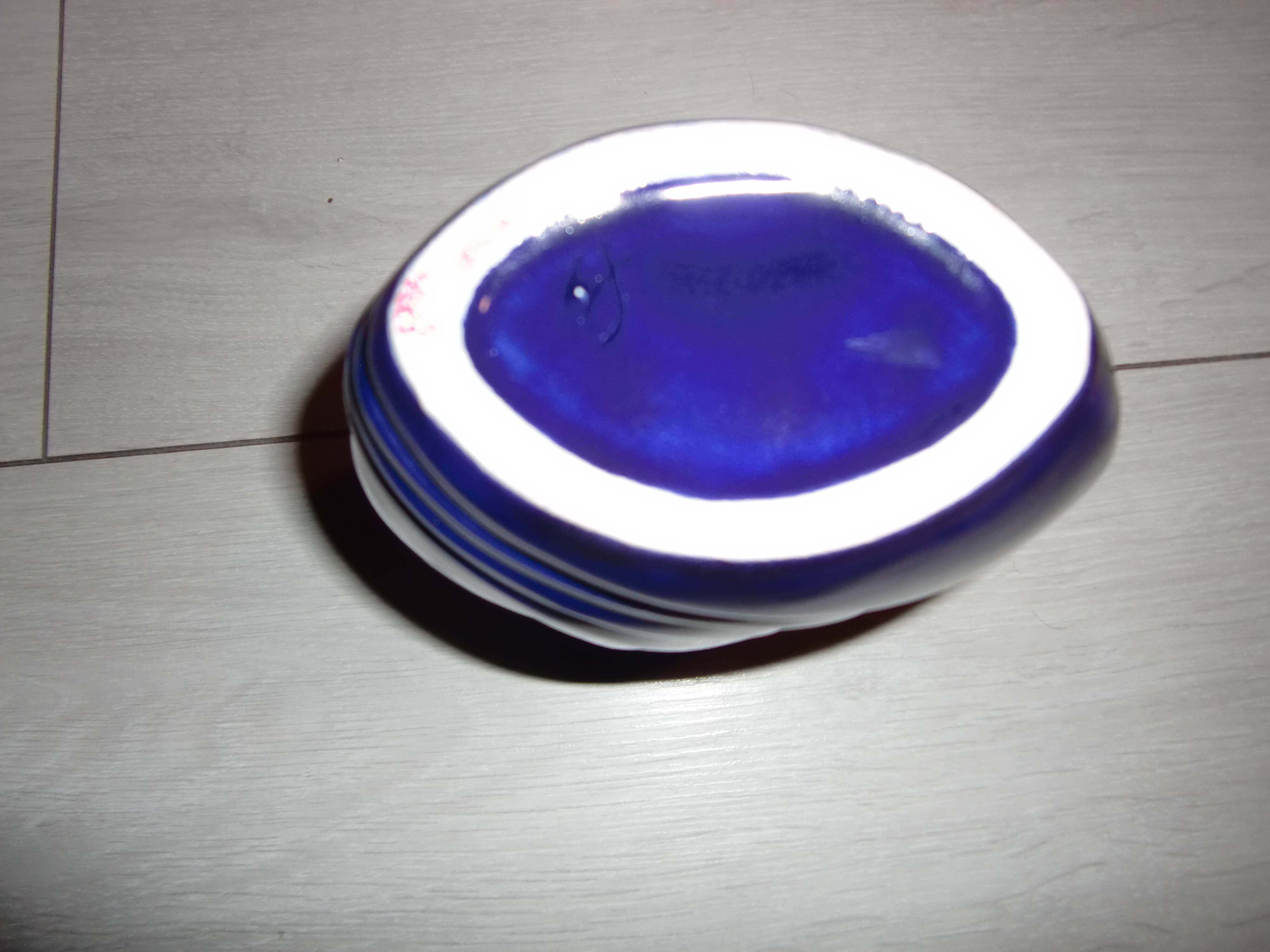 Blue lacquered vase with flowers & applied leaves