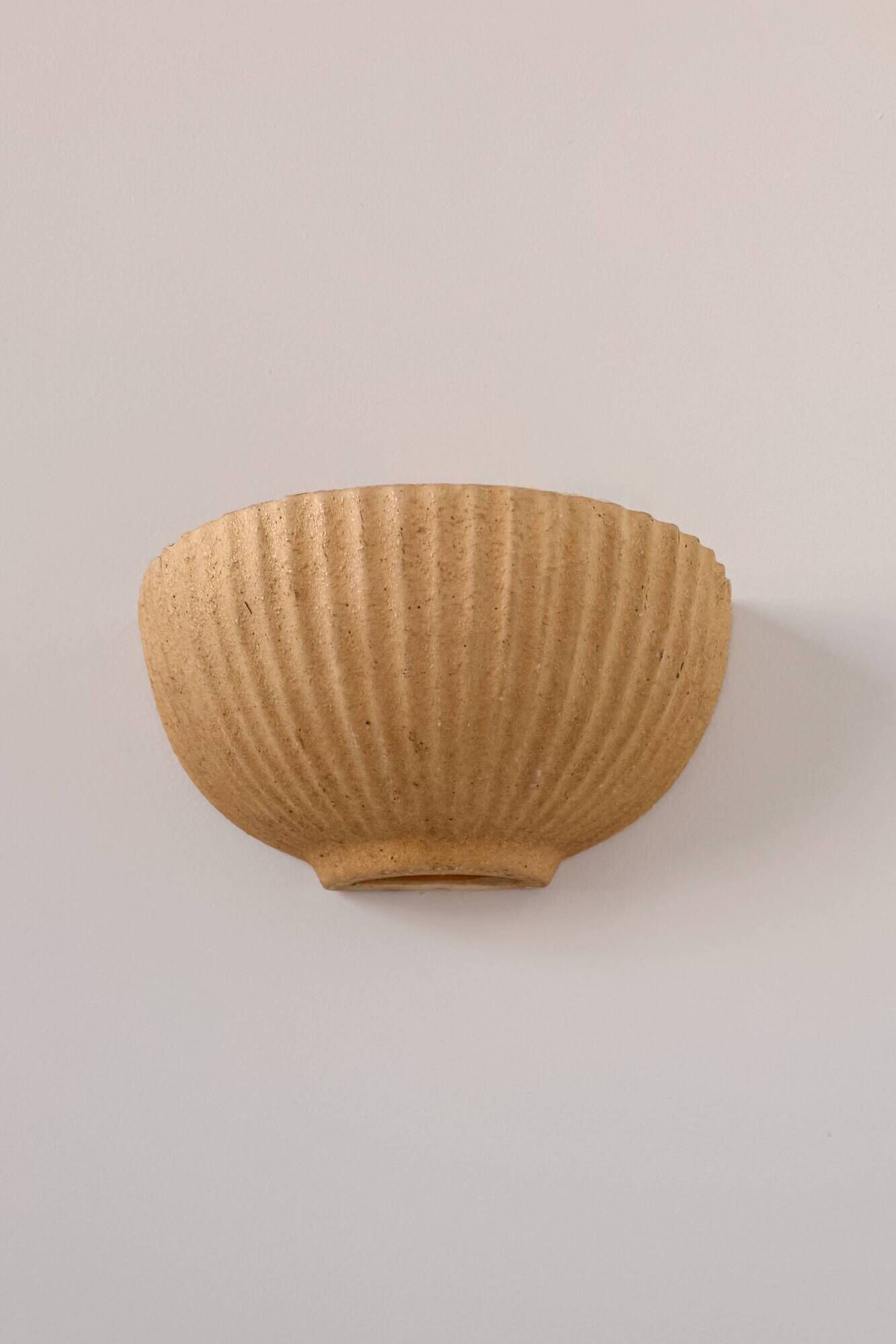 Pair of vintage beige ceramic wall lights, France, 1970.